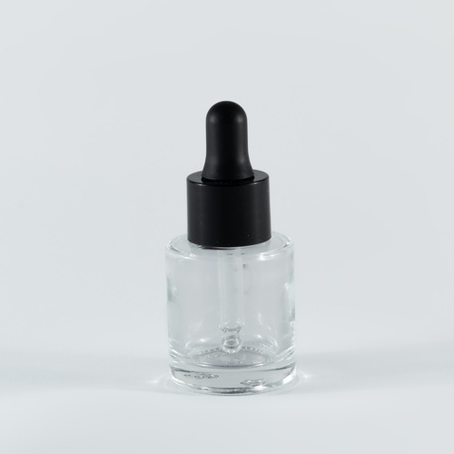 Transparent glass bottle with a black plastic pippet - 20ml